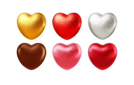 Set of realistic heart shaped chocolates wrapped in foil candy wrapper. Festive design element for Happy Valentines Day. Vector illustration EPS10
