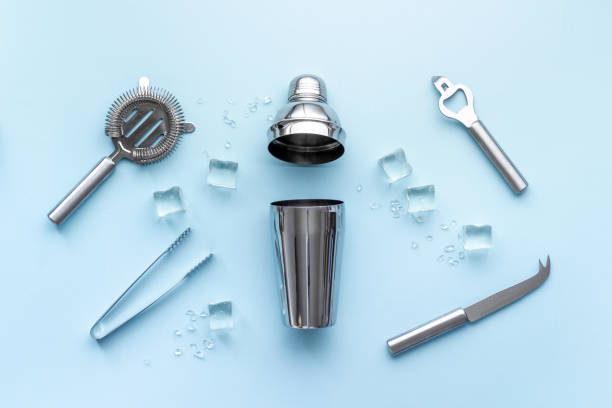 istock Bar tools and utensils for cocktail - with shaker, strainer and ice 1300972986