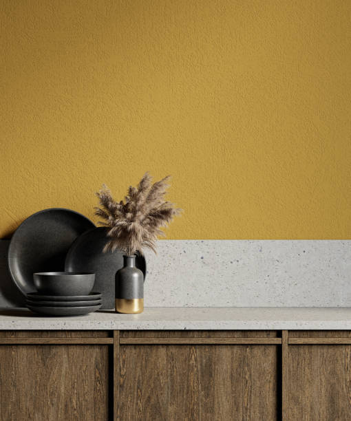 istock Yellow kitchen interior with stone countertop and decor. 1300973162