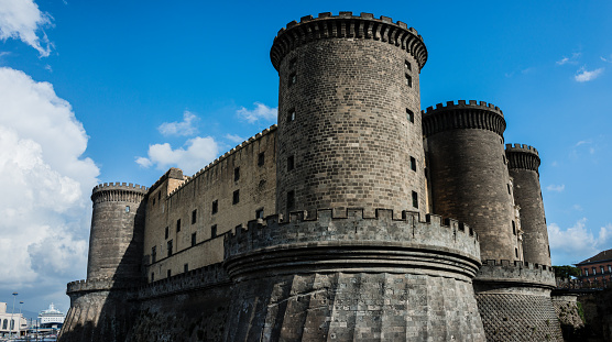 Castel Nuovo / New Castle, also called Maschio Angioino, a 13th century castle and the symbol of Naples, Italy. The Alfonso I Triumph Arch between the towers is the most important Renaissance work in Naples