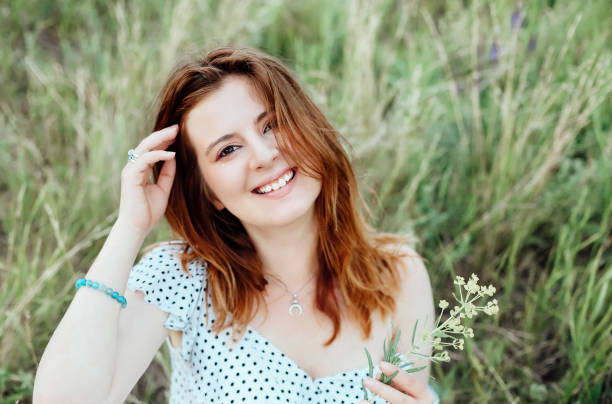 istock Young woman resting in countryside 1300974406