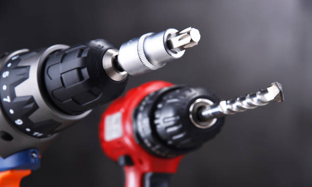 istock A screw gun and a pistol-grip cordless drill 1300974411