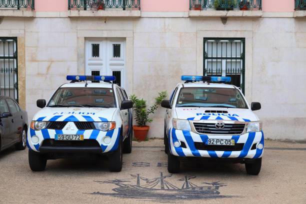 Portuguese Police, Lisbon Mitsubishi L200 and Toyota Hilux of Portugal Police. The full name of the Portugese force is Public Security Police (PSP). psp stock pictures, royalty-free photos & images