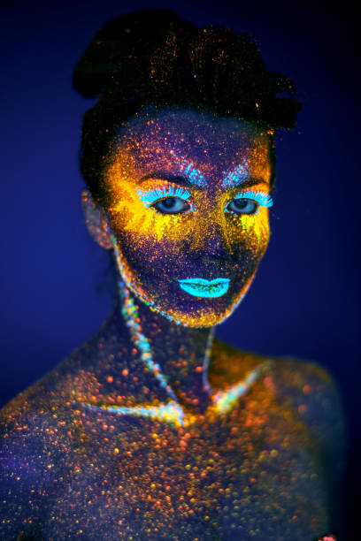istock close up uv portrait glowing in a dark 1300976948