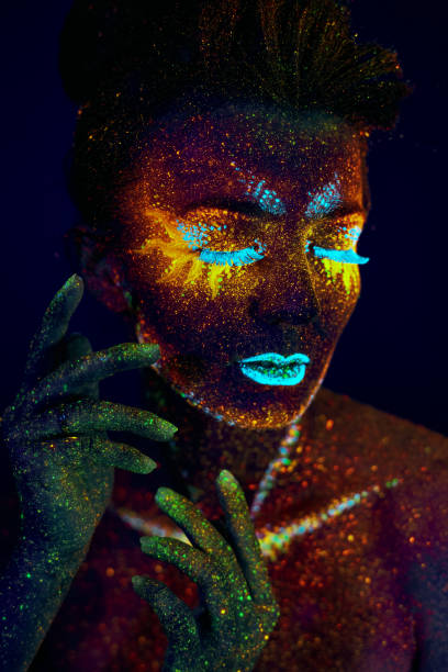 istock close up uv portrait glowing in a dark 1300977005