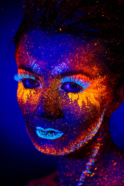istock close up uv portrait glowing in a dark 1300977181