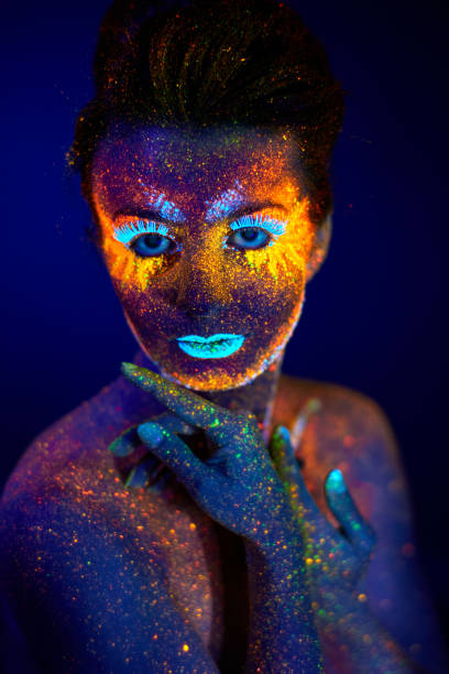 istock close up uv portrait glowing in a dark 1300977194