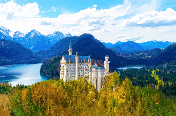 view of the famous tourist attraction in the Bavarian Alps - the 19th century Neuschwanstein castle. Hohenschwangau, Germany - May 28, 2017: famous tourist attraction in the Bavarian Alps - the 19th century Neuschwanstein castle at Hohenschwangau, Germany on May 28, 2017. allgau stock pictures, royalty-free photos & images
