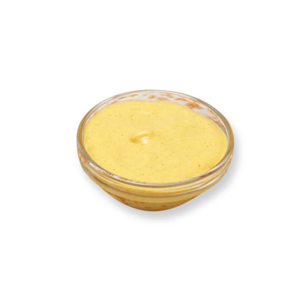 istock Mustard served in a bowl isolated on white background 1300981132