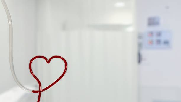 Blood transfusion system in hospital - heart shape stock photo