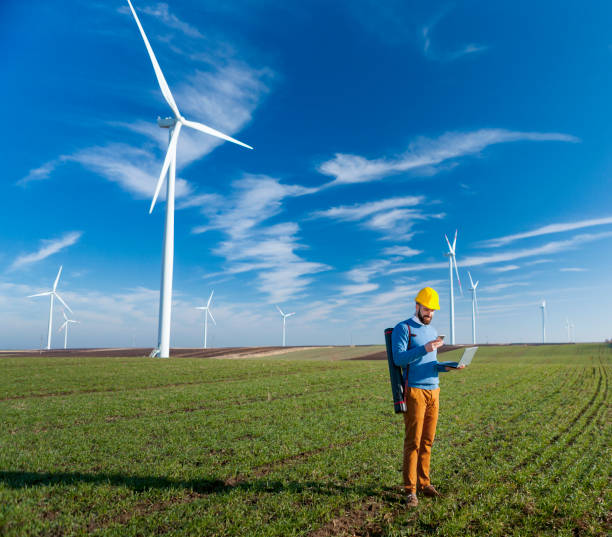 istock Male Caucasian engineer at wind farm 1300986168