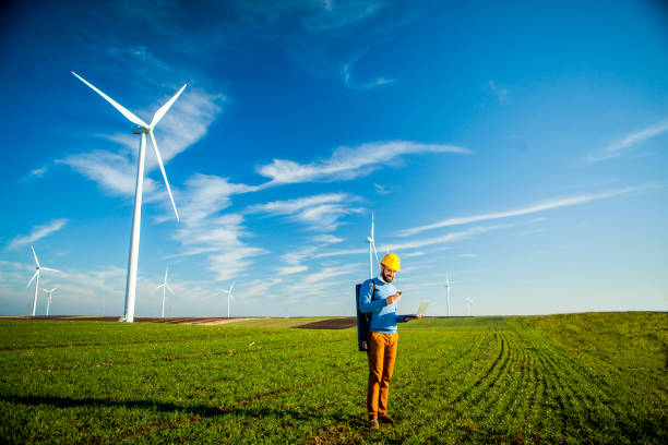 istock Male Caucasian engineer at wind farm 1300986209