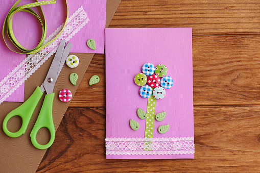 Floral pattern paper cards for Women day 8 march. International Women day flower cards diy paper crafts ideas for kids. Happy Women day 8 march background. Handmade March 8 postcard diy design. Mothers day or Women day or birthday gift cards designs. Handmade button birthday card present ideas for mum. DIY Mothers day button crafts handmade cards gift. Spring Mothers day background