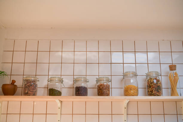 istock Cooking pan hanging on the kitchen wall after cleaning is complete. 1300987796