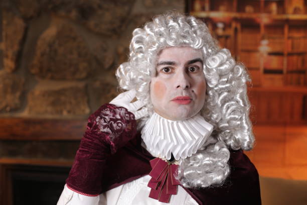 istock Baroque man in traditional library 1300988328