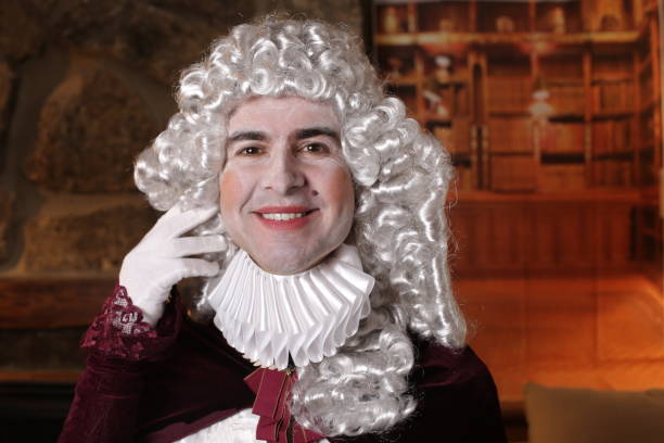 istock Baroque man in traditional library 1300988354