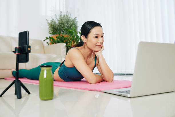istock Fitness blogger reading comments 1300988732