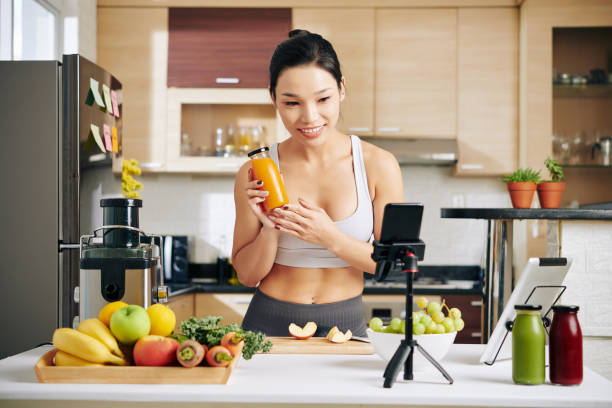 istock Fitness blogger conducting online cooking class 1300988754