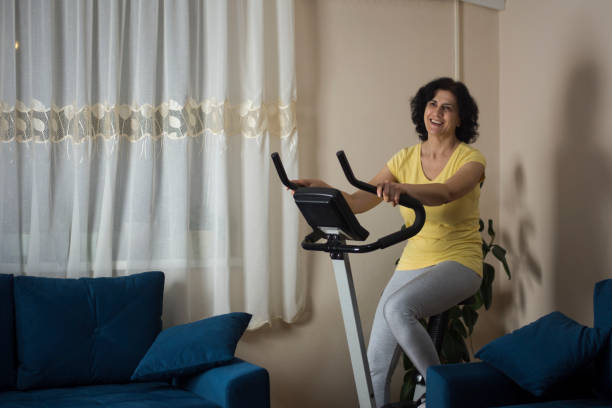 istock Senior woman training at home 1300989818