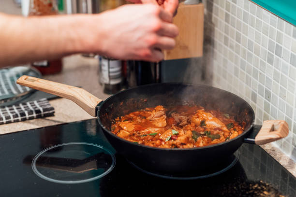 istock Seasoning the Food 1300990592