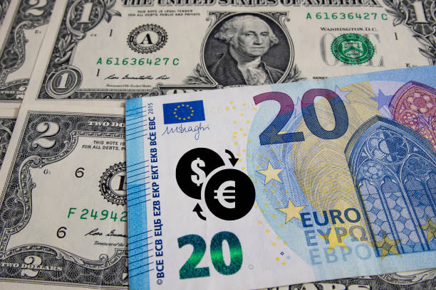 istock close up US dollar and Euro banknotes. 1300992434