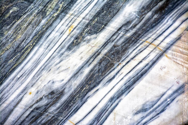istock Various types of marble in an abandoned quarry in Ruskeala i 1300992656