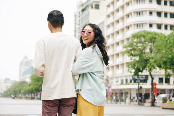 istock Pretty woman walking with boyfriend 1300993765