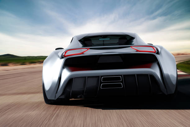 istock grey sportscar driving on a race track 1300994250