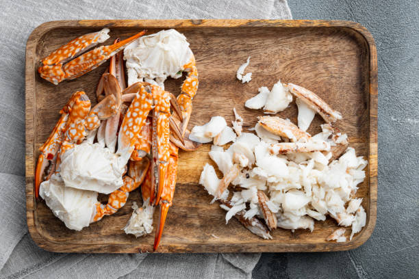 istock Boiled blue swimming crab claws, on gray background, top view flat lay 1300997270
