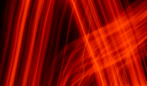 istock red luminous lines on a black background 1300998574
