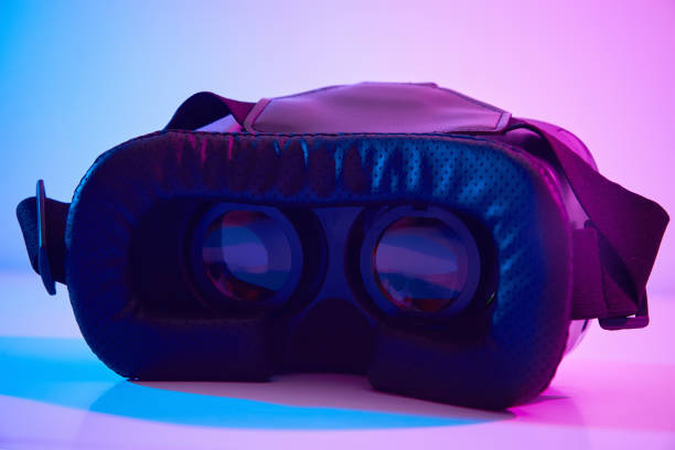 istock Virtual reality glasses on colorful background. Future technology, VR concept 1301000238