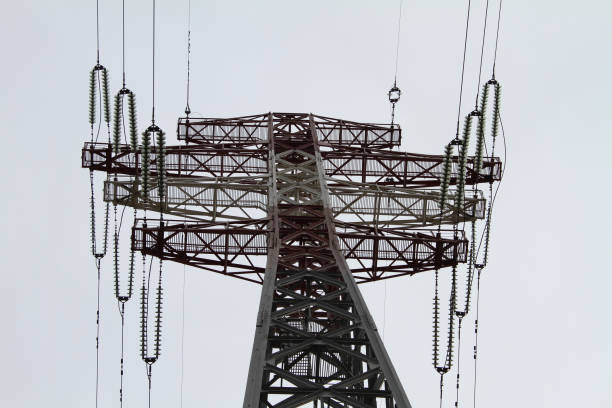 istock Top Of Electricity Pillar With Wires Bottom View 1301000776