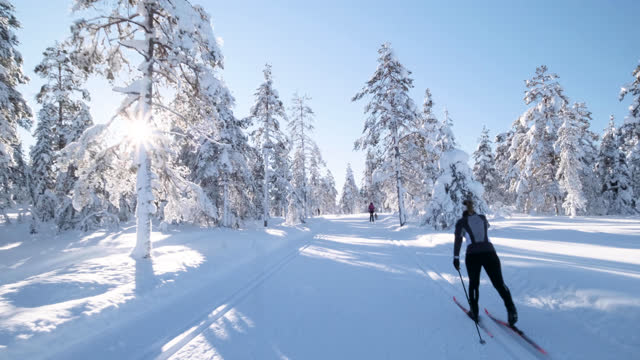 Woman cross-country skiing in Norway