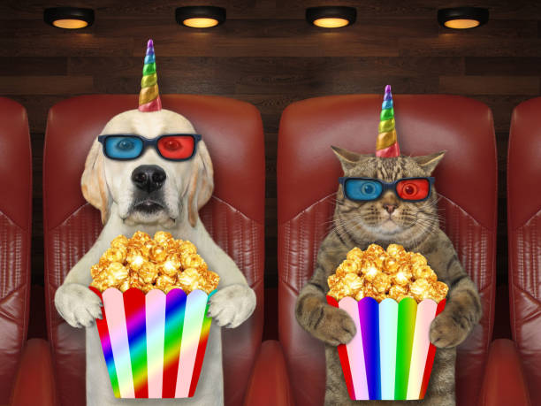 istock Pet unicorns in 3d glasses in cinema 1301004334