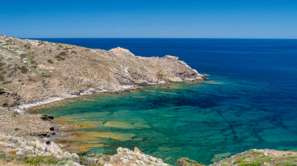 istock azure blue sea with rocks and stones 1301005270