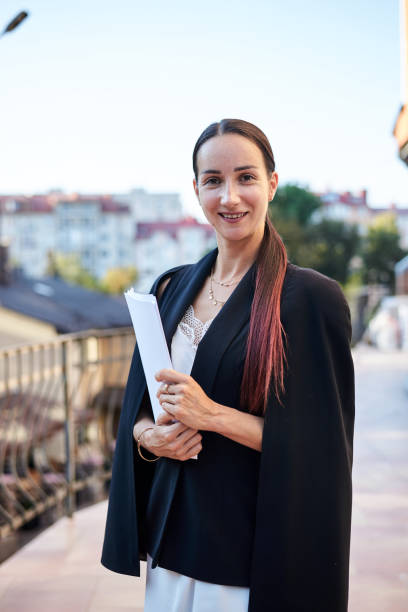 istock Female portrait with city view 1301007696