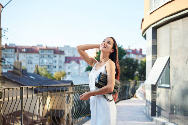 istock Female portrait with city view 1301007862
