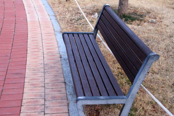 istock Chairs on a park promenade in Korea at park 1301008191