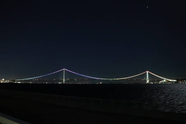 istock Akashi Kaikyo Bridge illuminated at night 1301011456