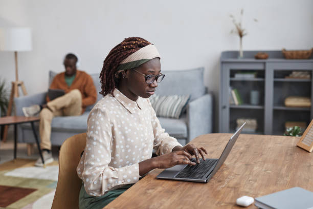istock Young African Woman Working from Home 1301014366