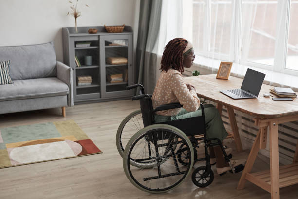 istock Handicapped Woman Working from Home 1301014413