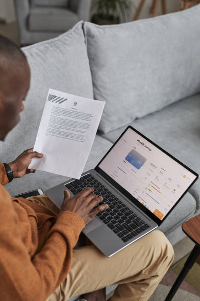 istock African American Man Using Online Banking 1301014526