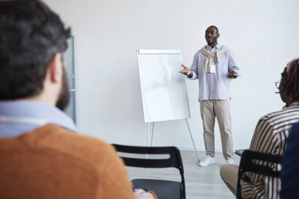 istock African-American Speaker at Conference 1301017475