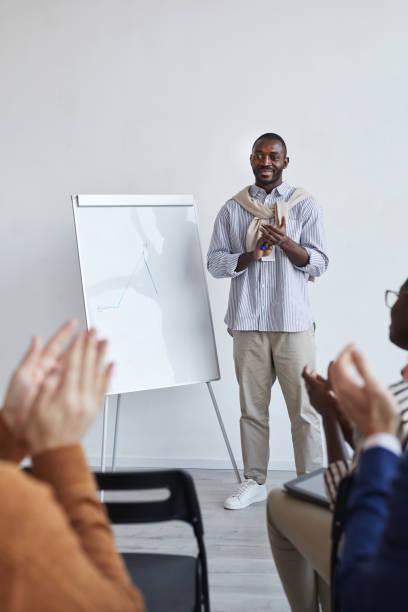 istock African-American Speaker at Presentation 1301017493