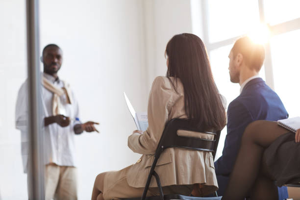 istock Business Coach Talking to Audience 1301017494