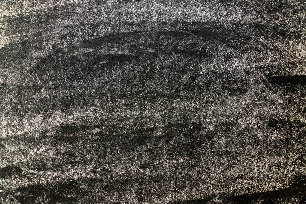 istock Grunge white color chalk textured on blank blackboard background with copy space 1301019746