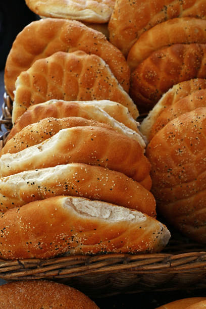 istock Close up fresh flatbread loaves on retail display 1301023998
