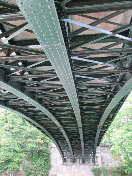 istock Steel bridge to cross a river  View from below 1301027659