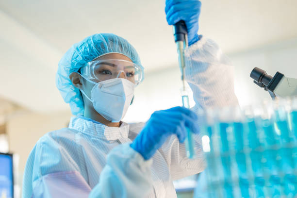 istock asian scientist take test tube 1301029005