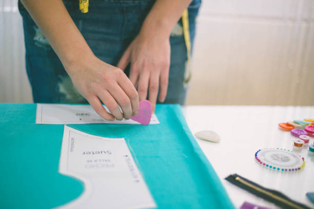 istock Young fashion designer working with a sewing machine 1301029217